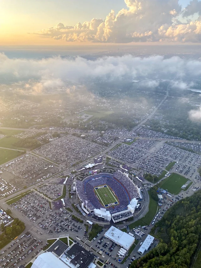 Aerial view of Highmark Stadium at sunset, home of Buffalo football